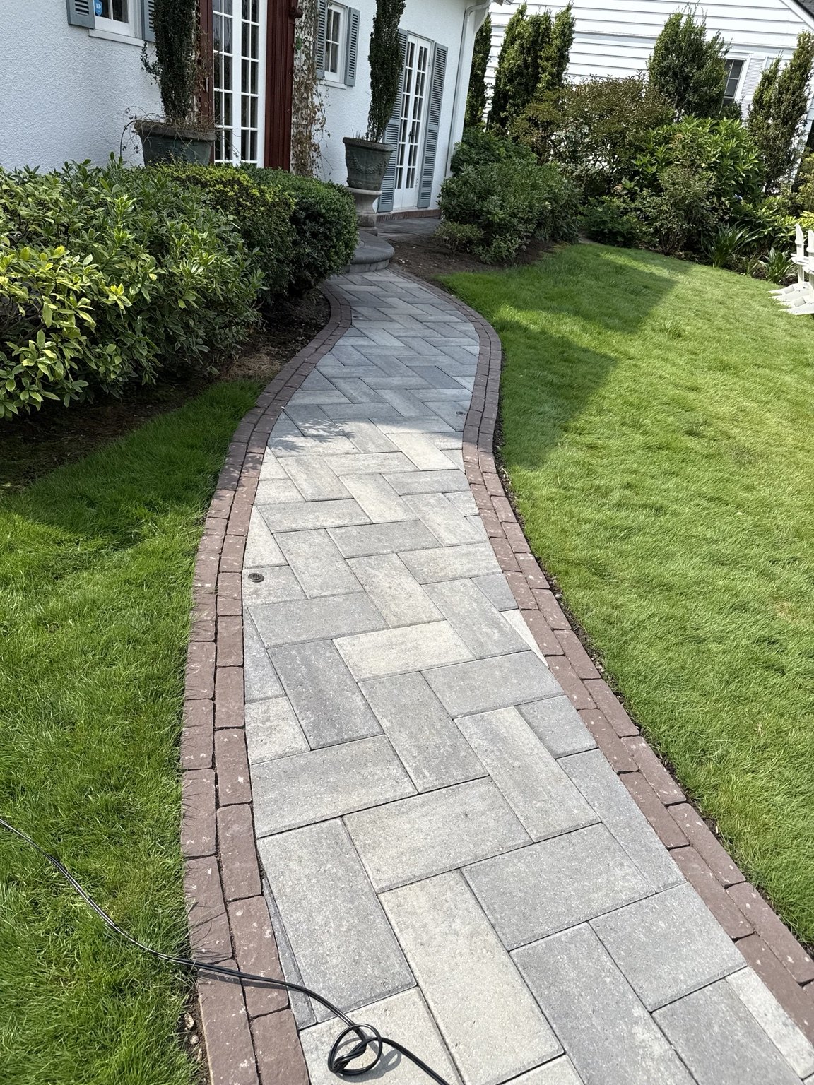 AM Hardscape project: Curved front walkway